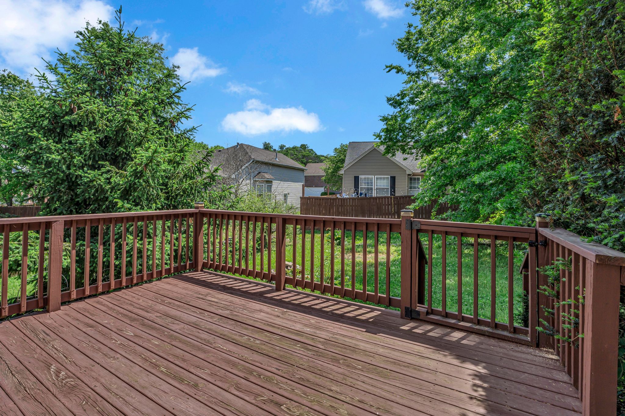 1264 West Running Brook Road Nashville, TN 37209 - Photo 23 of 28 a view of a wooden roof deck