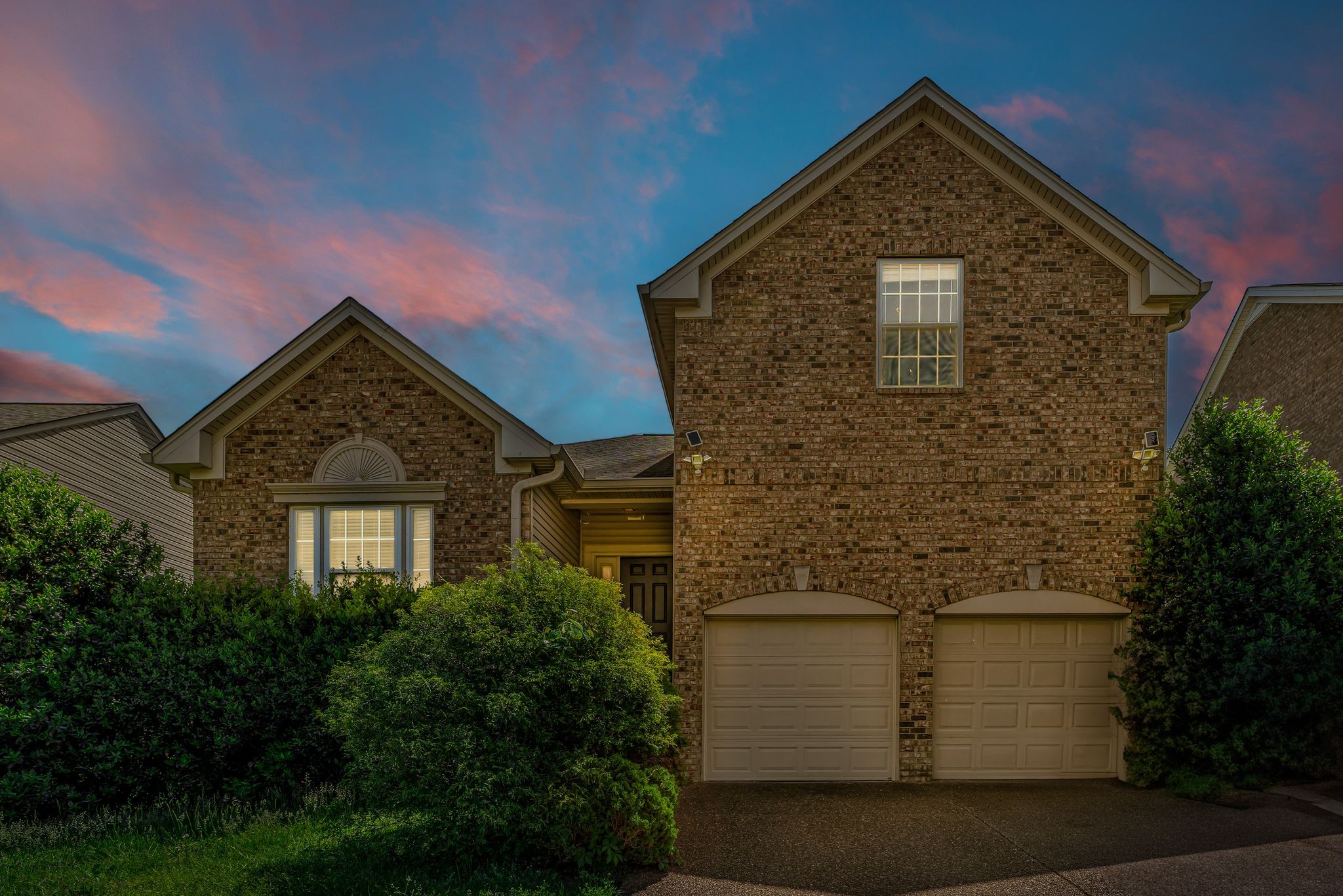 1264 West Running Brook Road Nashville, TN 37209 - Photo 3 of 28 a front view of a house with plants