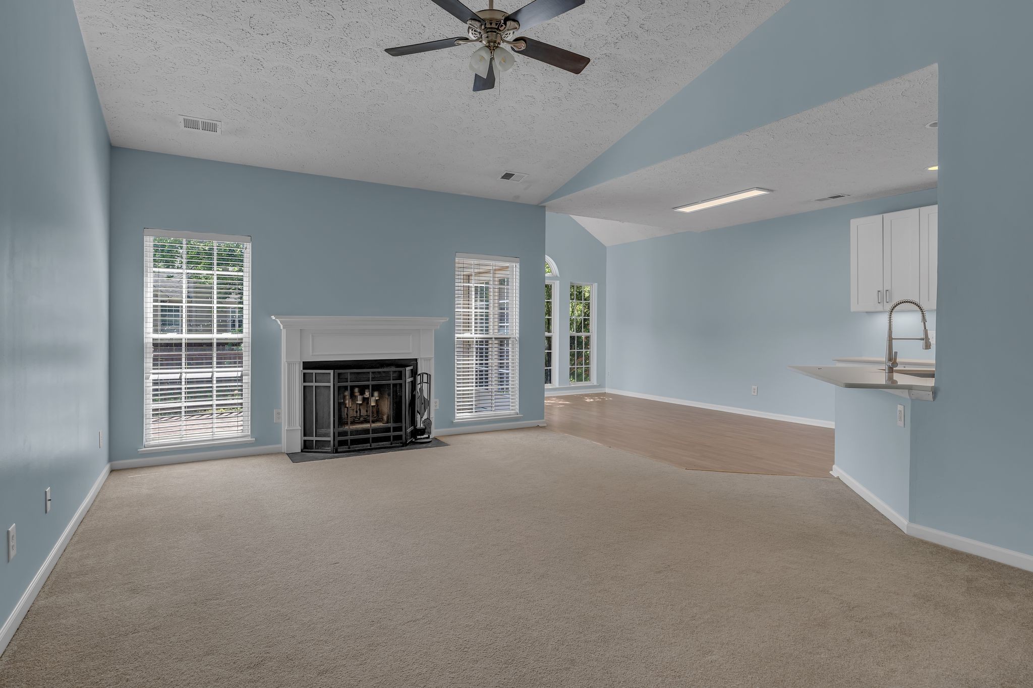 1264 West Running Brook Road Nashville, TN 37209 - Photo 4 of 28 a view of an empty room with a fireplace and a window