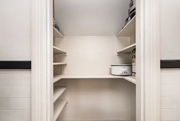 a view of an empty walk in closet
