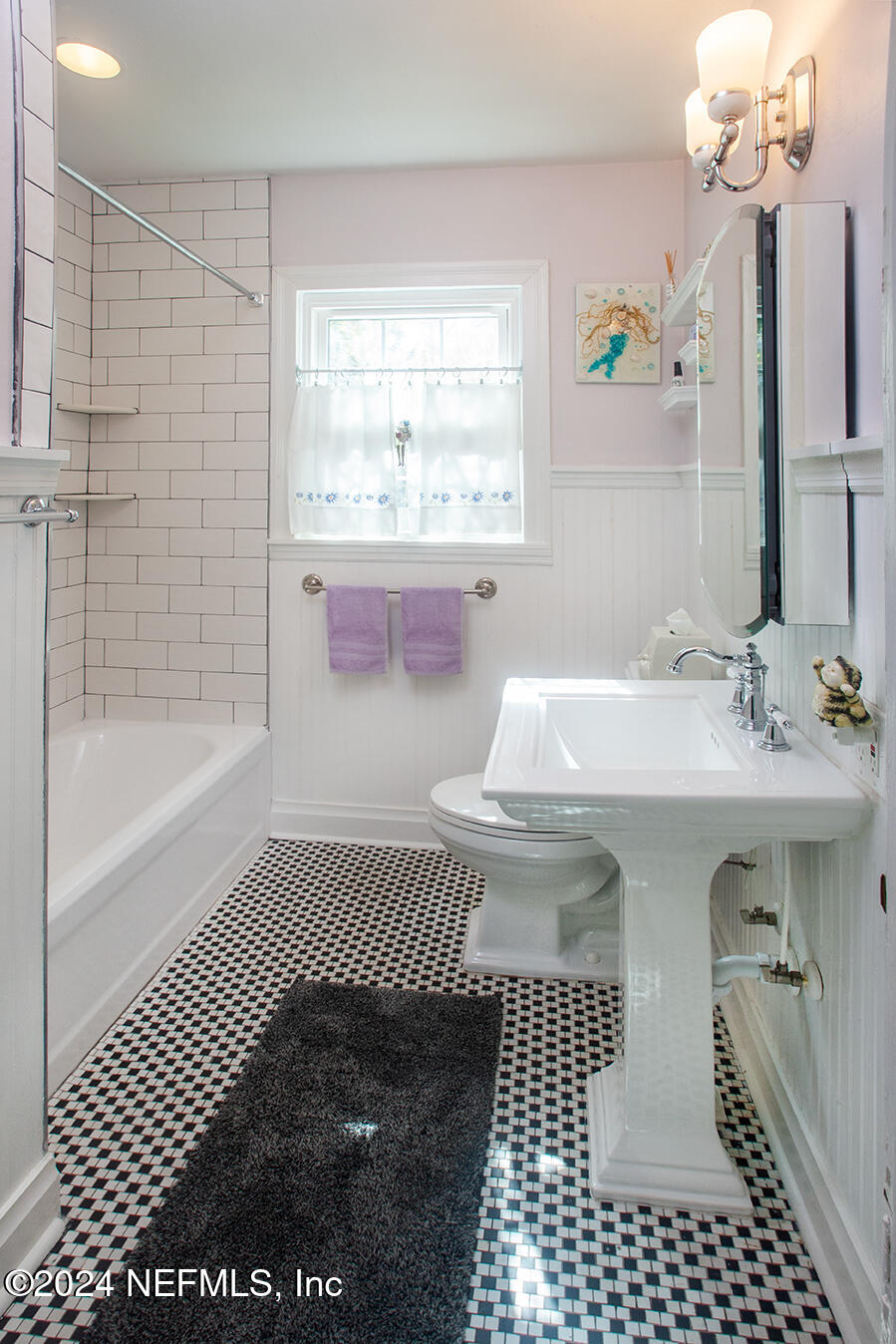 1117 Old Hickory Road Jacksonville, FL 32207 - Photo 13 of 14 a bathroom with a sink a toilet and shower