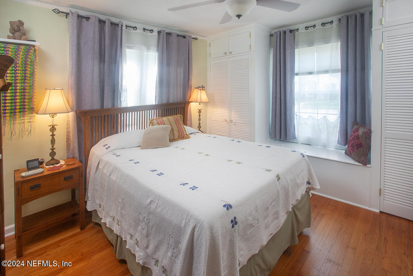 1117 Old Hickory Road Jacksonville, FL 32207 - Photo 9 of 14 a bedroom with a bed and wooden floor