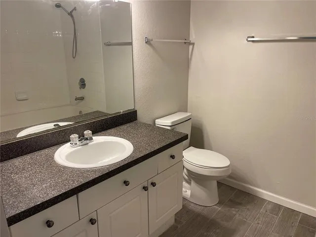 a bathroom with a sink and a toilet