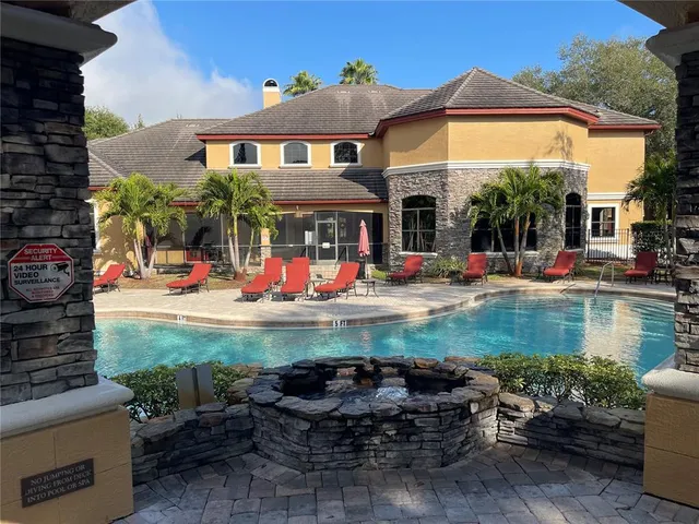 a view of outdoor space yard and swimming pool