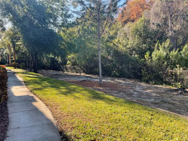 a view of a swimming pool with an outdoor space and seating area