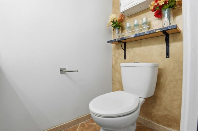 a bathroom with a toilet and a sink