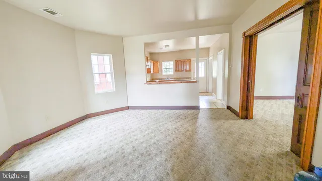 a view of a room with a large window