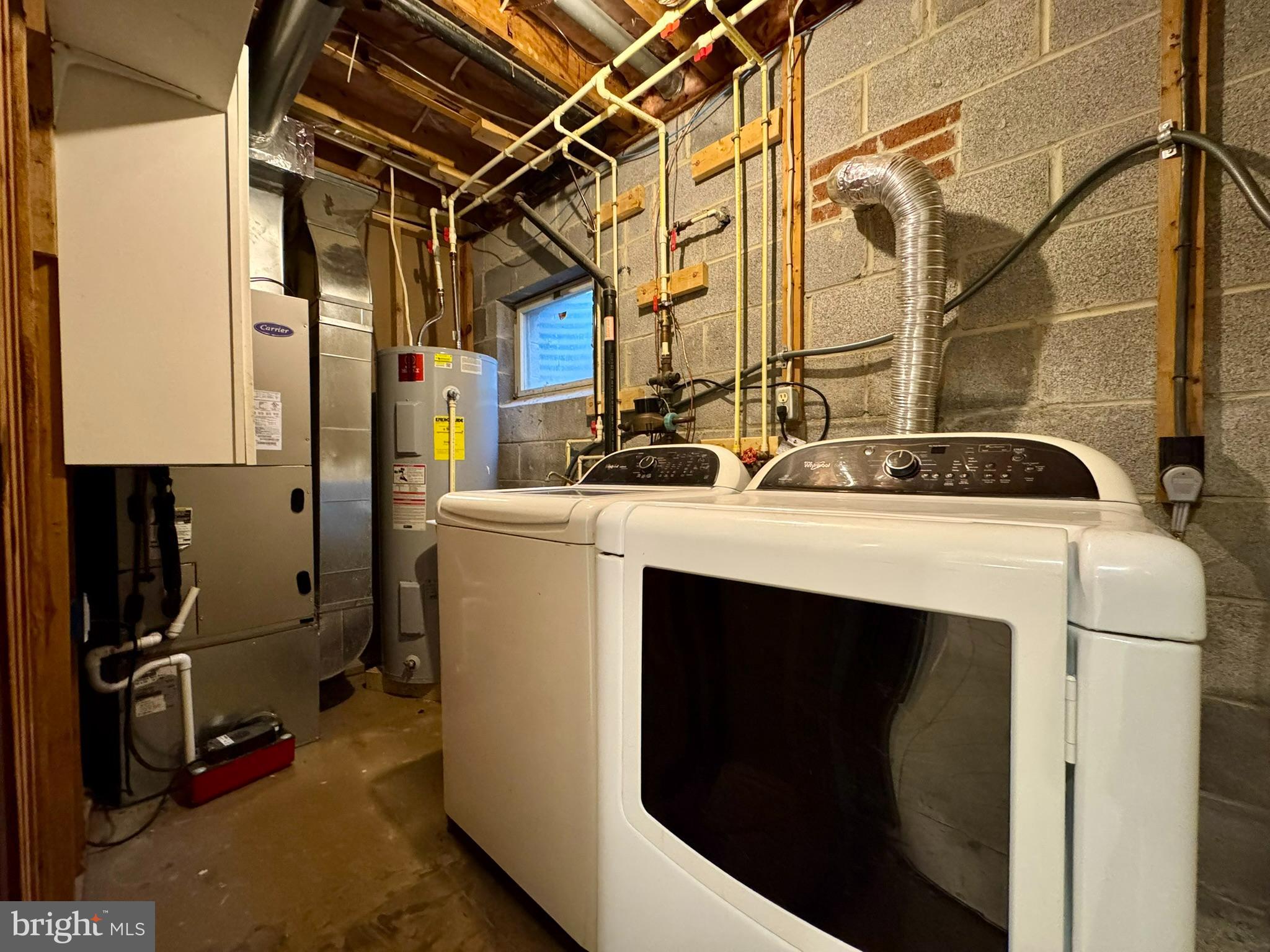 9813 Moyer Road Damascus, MD 20872 - Photo 22 of 31 a utility room with dryer and washer