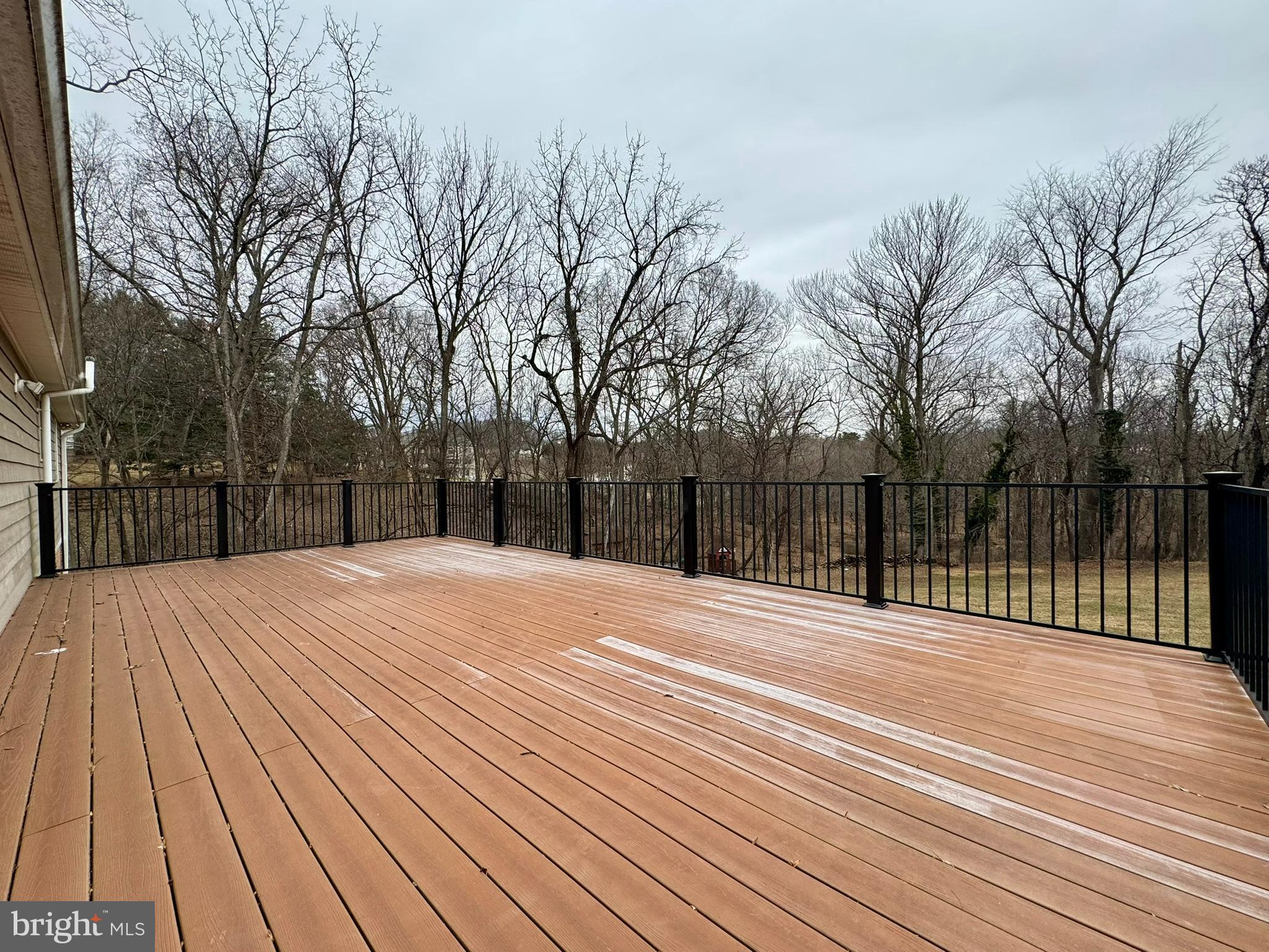 9813 Moyer Road Damascus, MD 20872 - Photo 27 of 31 a view of backyard with wooden floor