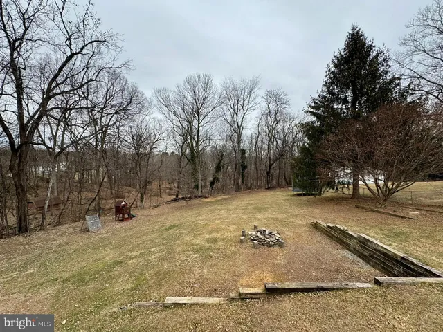 a view of a backyard of a house