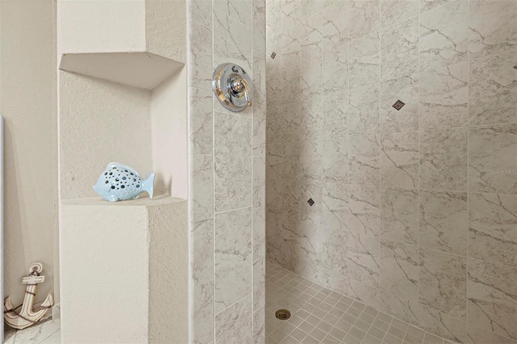 11014 Wren Road Brooksville, FL 34613 - Photo 24 of 50 a bathroom with a shower