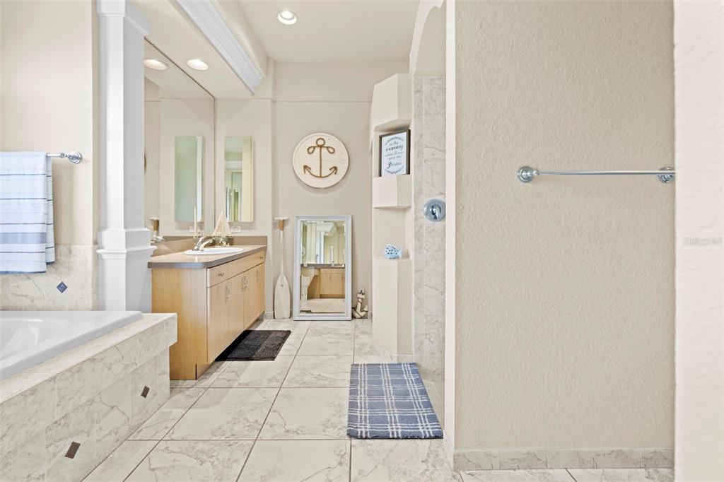 11014 Wren Road Brooksville, FL 34613 - Photo 25 of 50 a room with mirror and a window