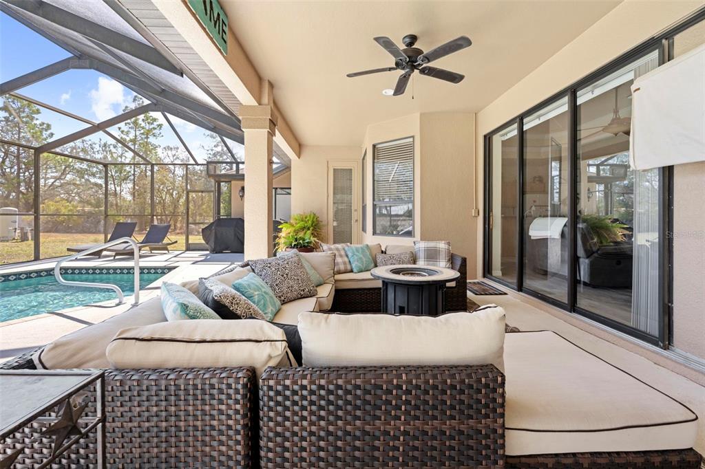 11014 Wren Road Brooksville, FL 34613 - Photo 33 of 50 a living room with furniture and a large window