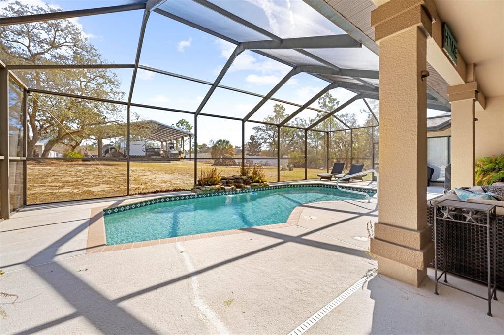 11014 Wren Road Brooksville, FL 34613 - Photo 34 of 50 a view of a porch with a backyard