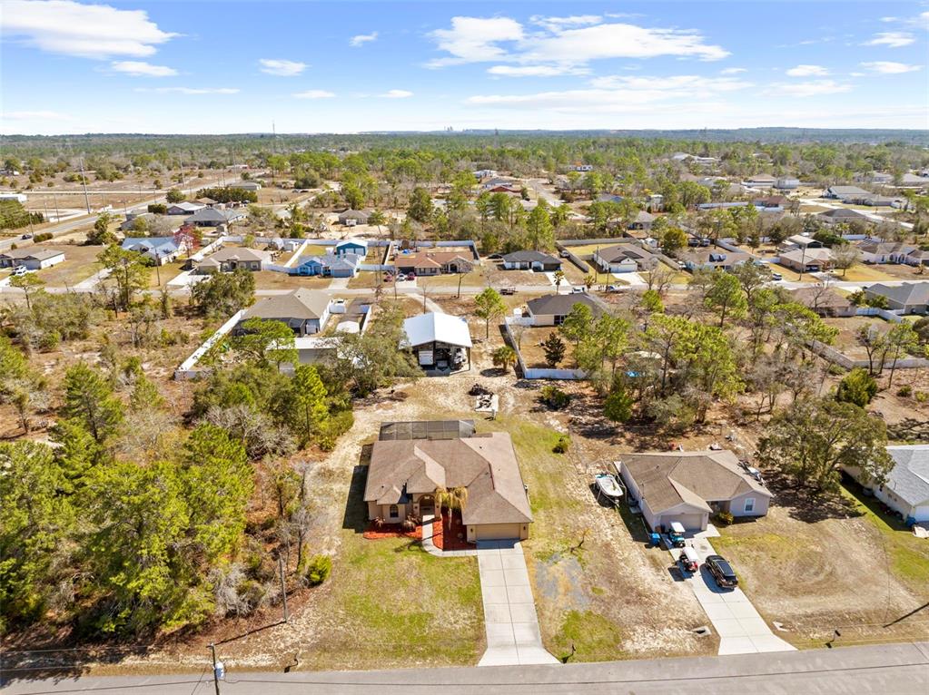11014 Wren Road Brooksville, FL 34613 - Photo 46 of 50 an aerial view of residential houses with outdoor space