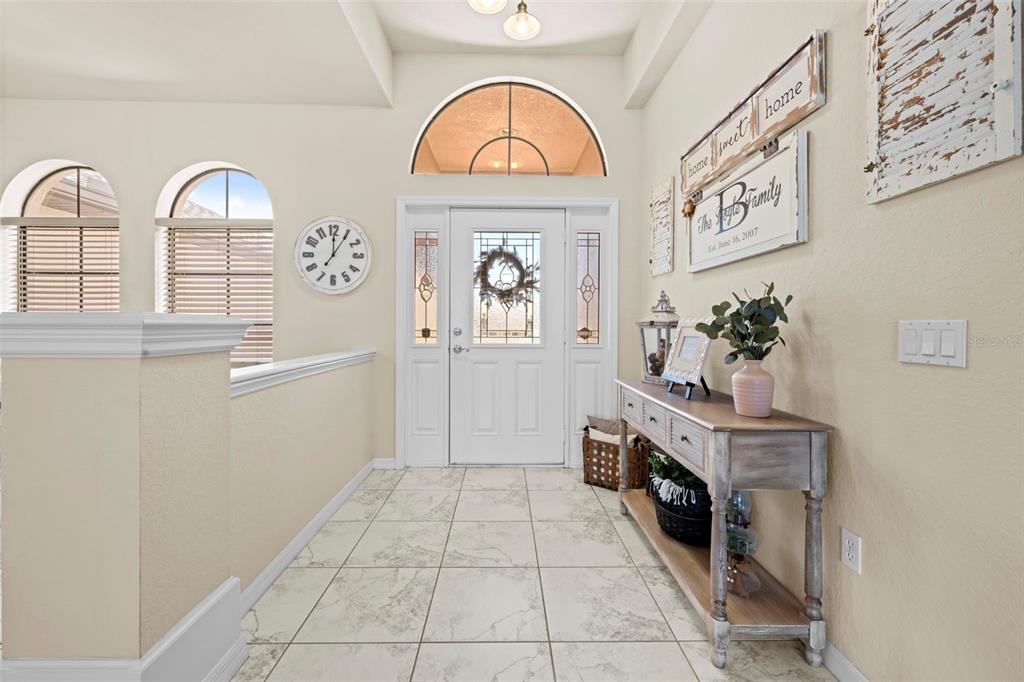 11014 Wren Road Brooksville, FL 34613 - Photo 5 of 50 a view of hall way with furniture and fireplace