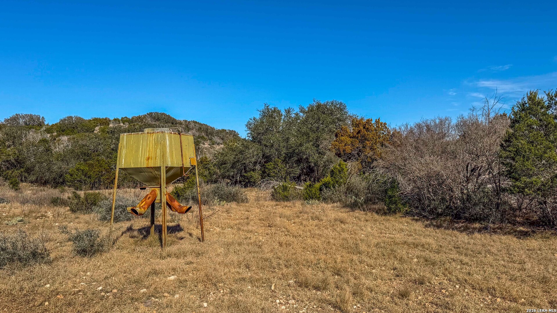 674 St Rocksprings Tx 78880 Rocksprings, TX 78880 - Photo 24 of 27 a view of a bench in a backyard