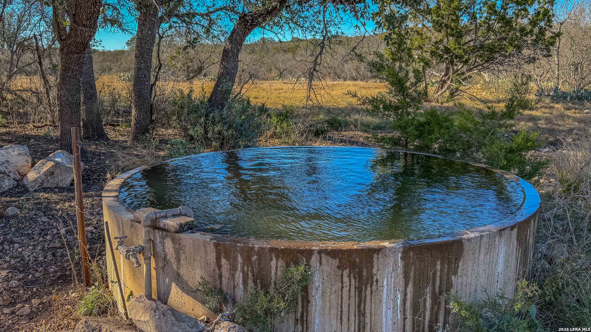 674 St Rocksprings Tx 78880 Rocksprings, TX 78880 - Photo 10 of 27 a view of a backyard with wooden fence