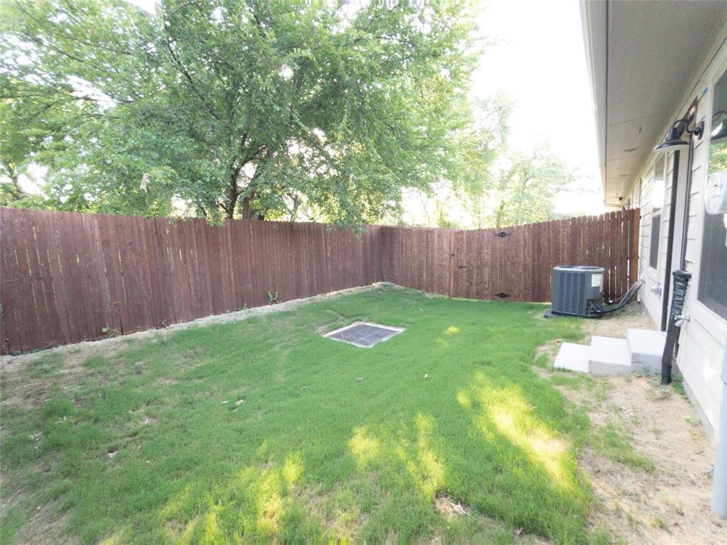 245 Honor Code Place Granbury, TX 76049 - Photo 16 of 16 a view of yard with green space