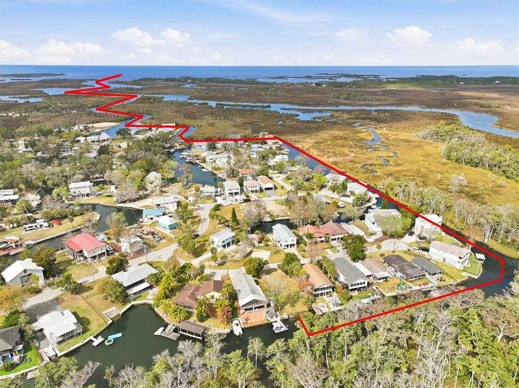 7304 Sunfish Circle Weeki Wachee, FL 34607 - Photo 18 of 23 a view of an ocean and beach