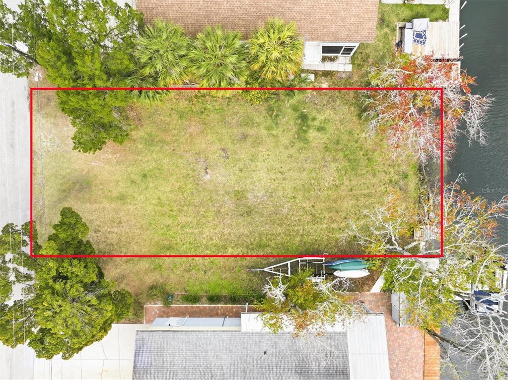 7304 Sunfish Circle Weeki Wachee, FL 34607 - Photo 10 of 23 a view of a lake from a balcony