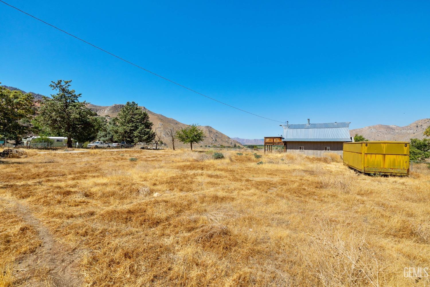 Undisclosed Address Onyx, CA 93255 - Photo 11 of 18 a view of ocean with large trees
