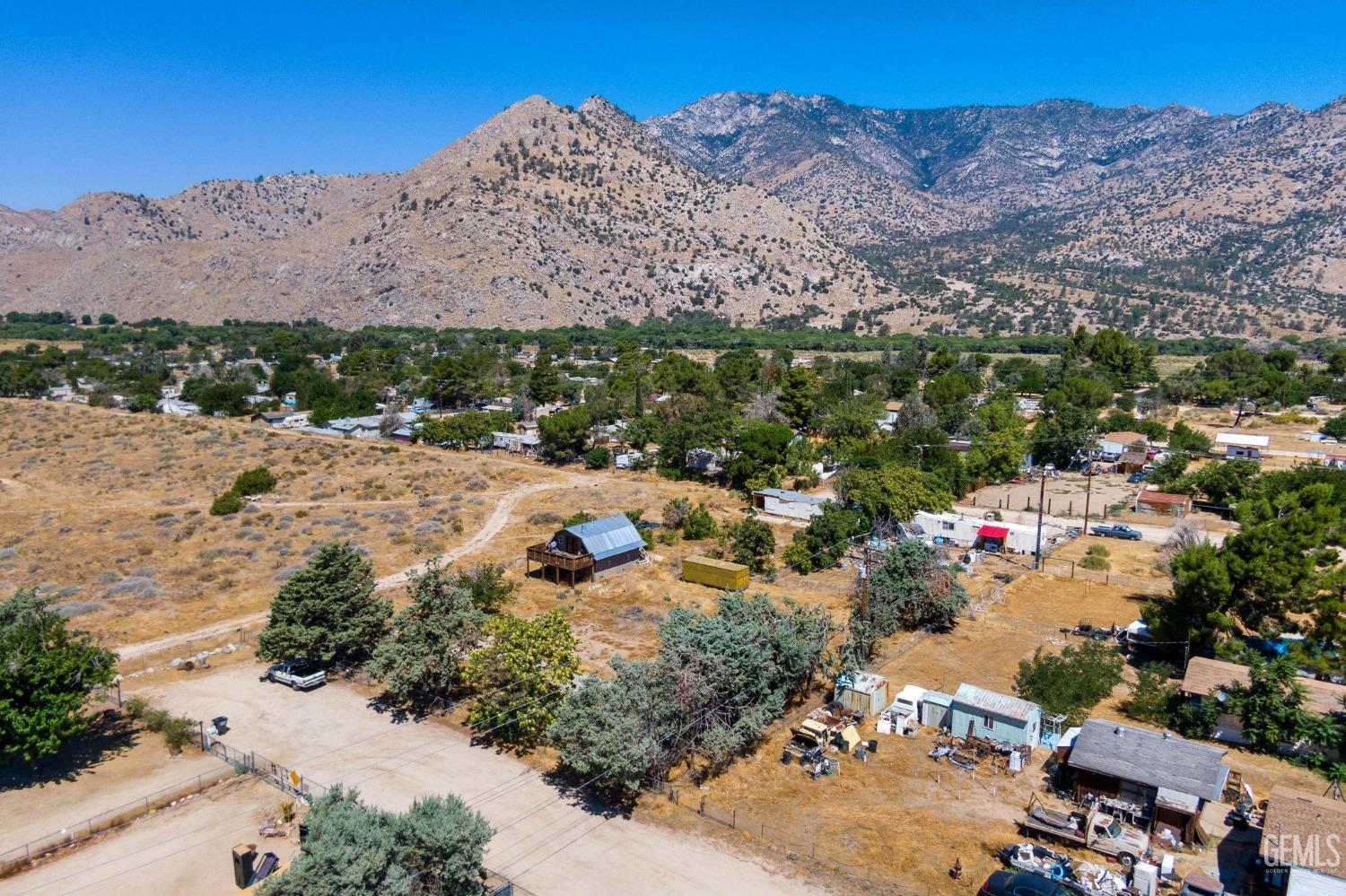 Undisclosed Address Onyx, CA 93255 - Photo 15 of 18 a view of a lot of trees and mountains