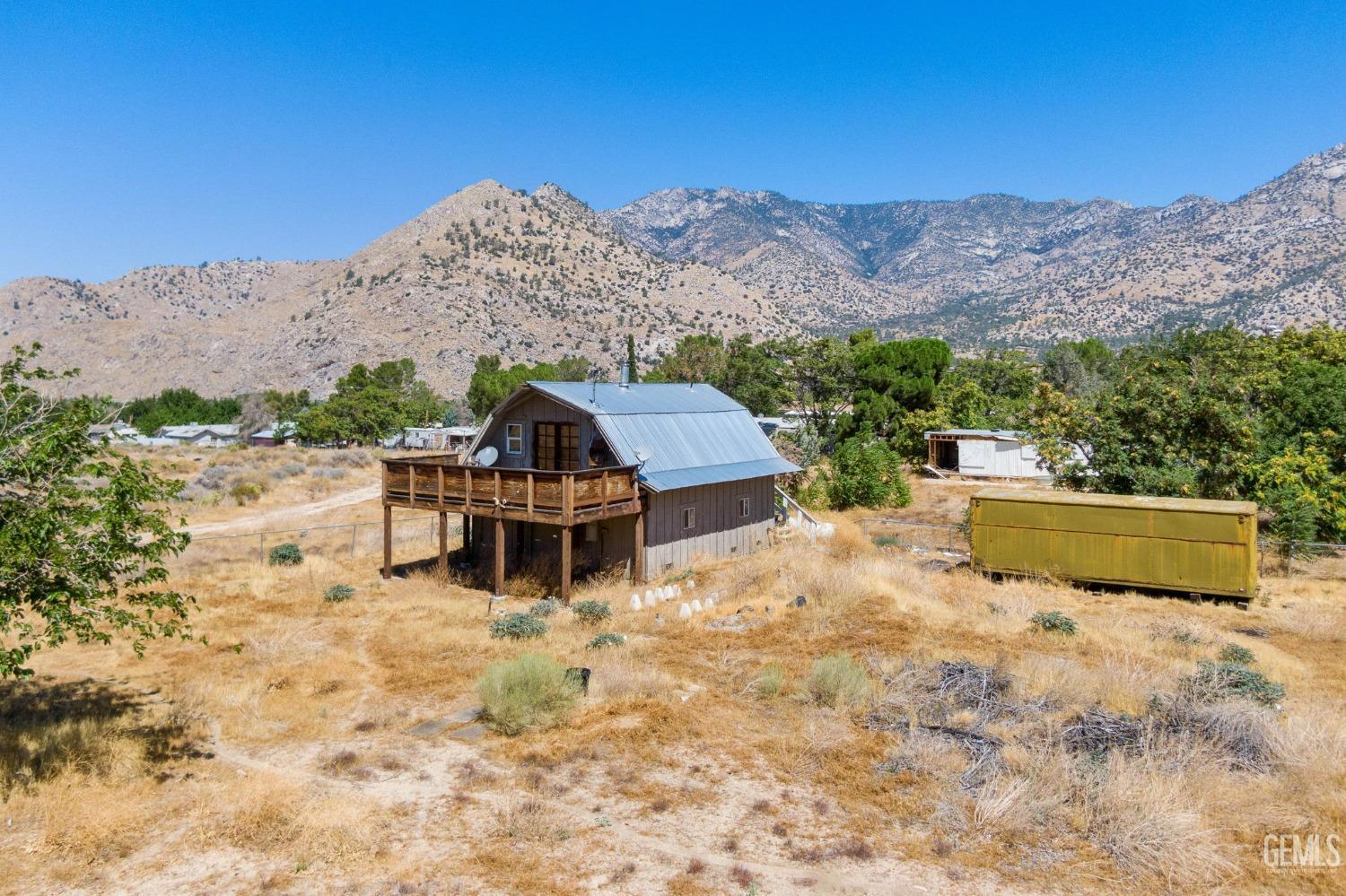 Undisclosed Address Onyx, CA 93255 - Photo 4 of 18 a swimming pool with mountain view
