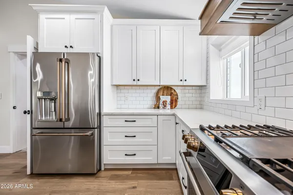 a room with furniture and a flat screen tv
