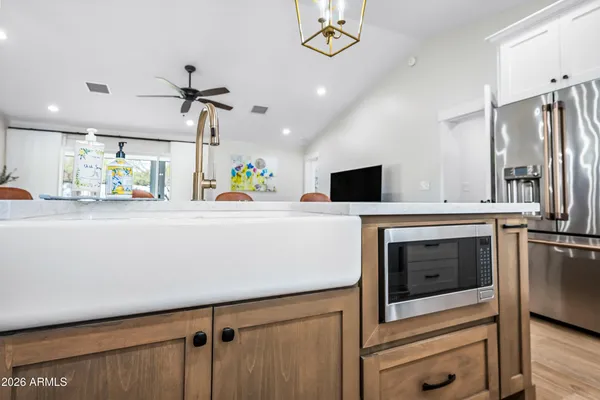 a bathroom with a sink and a window