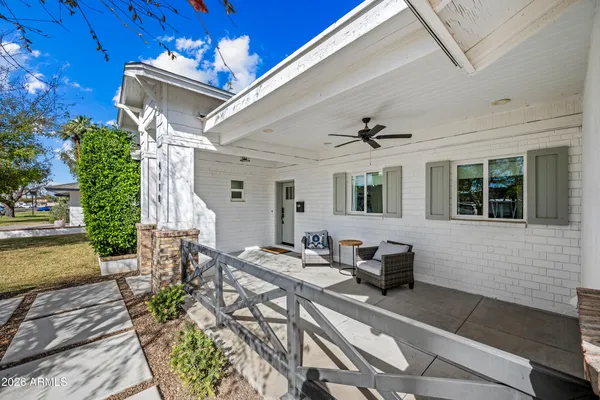 a view of a room with wooden floor and workspace