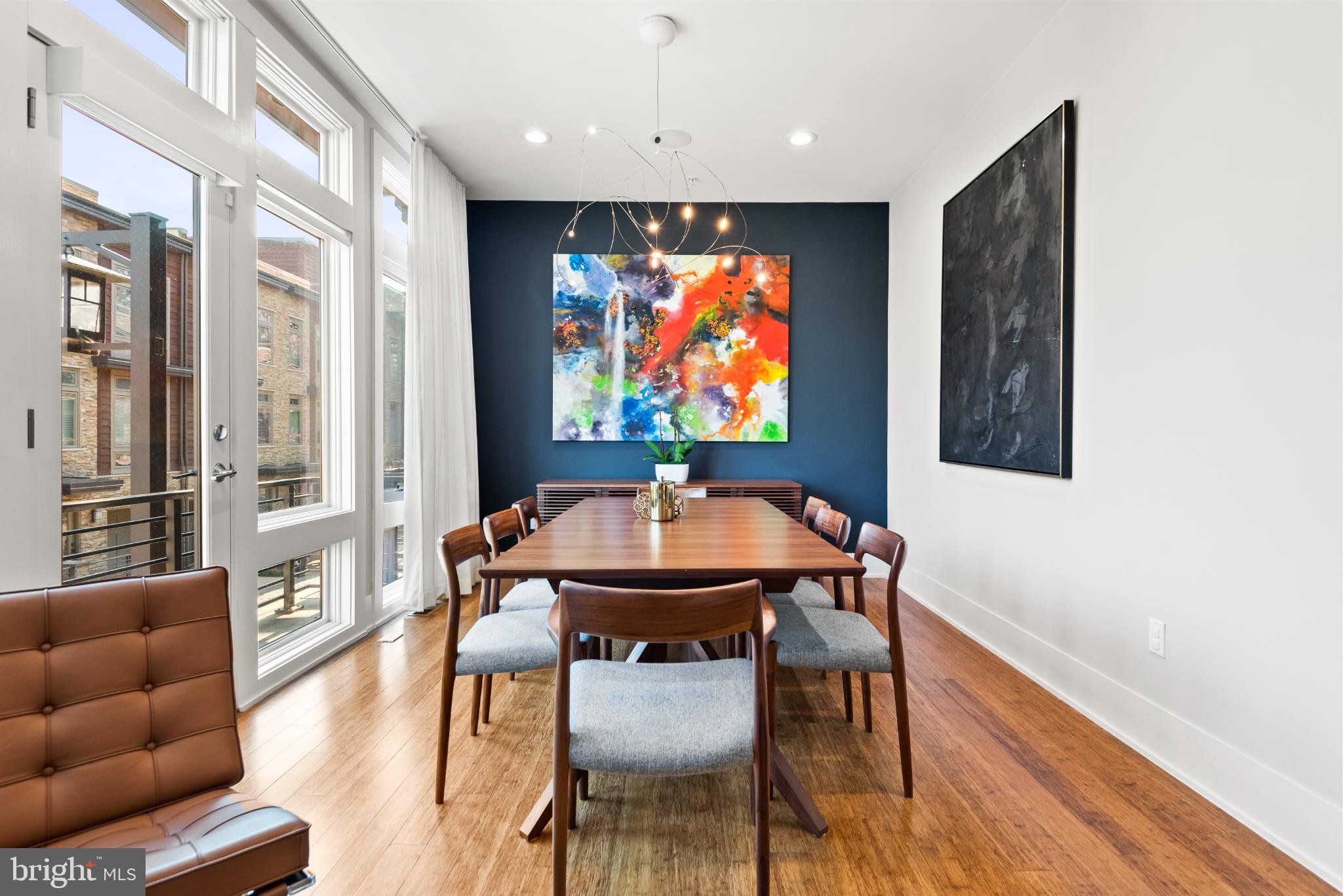 5117 Willet Bridge Road Bethesda, MD 20816 - Photo 12 of 46 a dining room with furniture and wooden floor