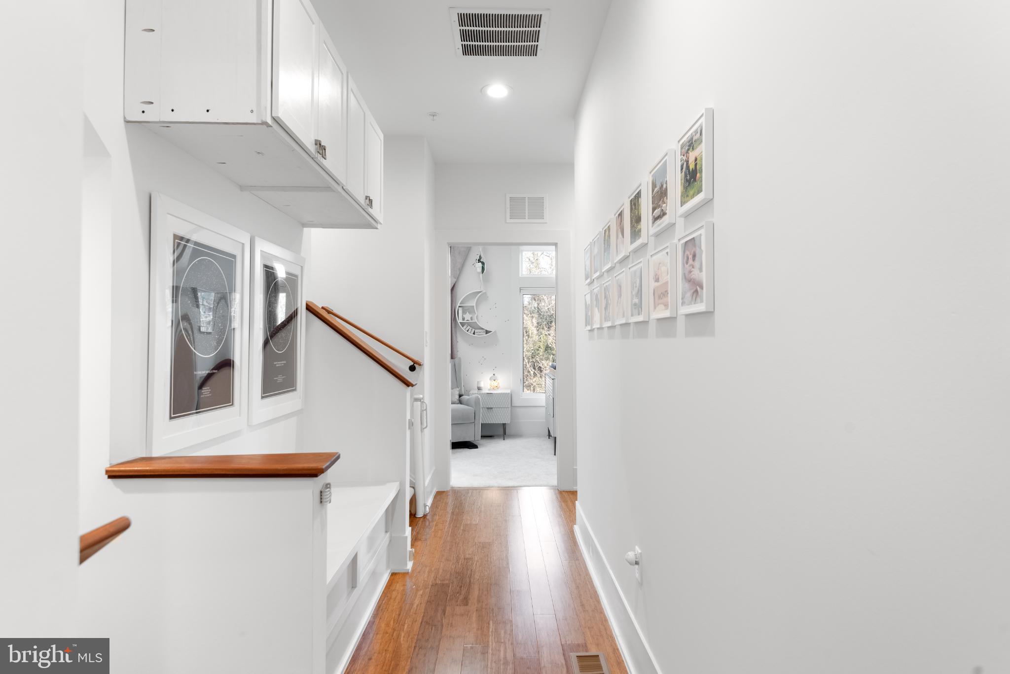 5117 Willet Bridge Road Bethesda, MD 20816 - Photo 25 of 46 a view of entryway and hall with wooden floor