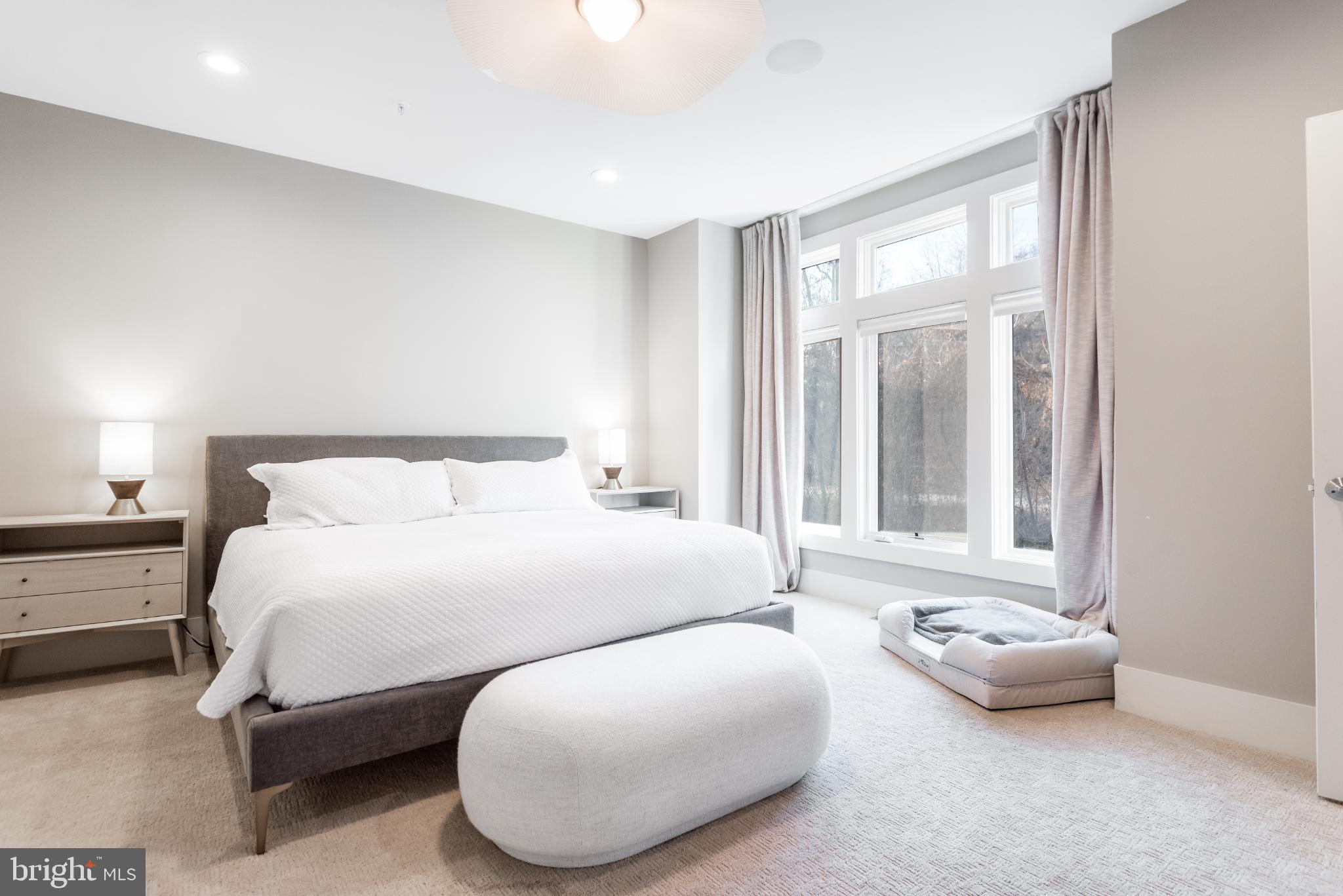 5117 Willet Bridge Road Bethesda, MD 20816 - Photo 26 of 46 a bedroom with bed and a window with outer view