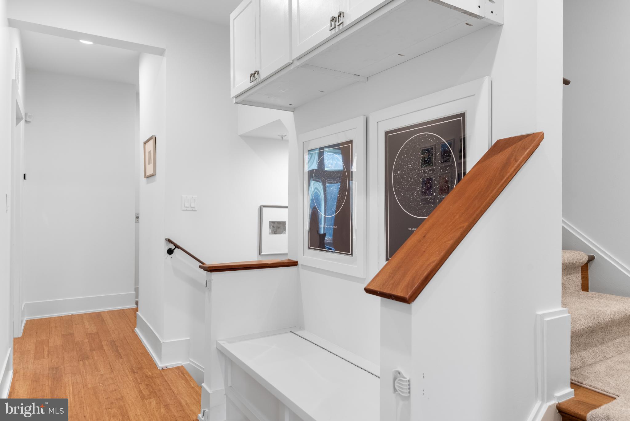 5117 Willet Bridge Road Bethesda, MD 20816 - Photo 36 of 46 a view of walk in closet with clothes and shoes