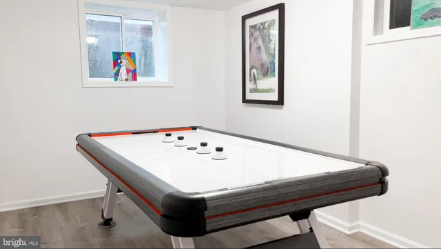 a bath tub sitting next to a white toilet