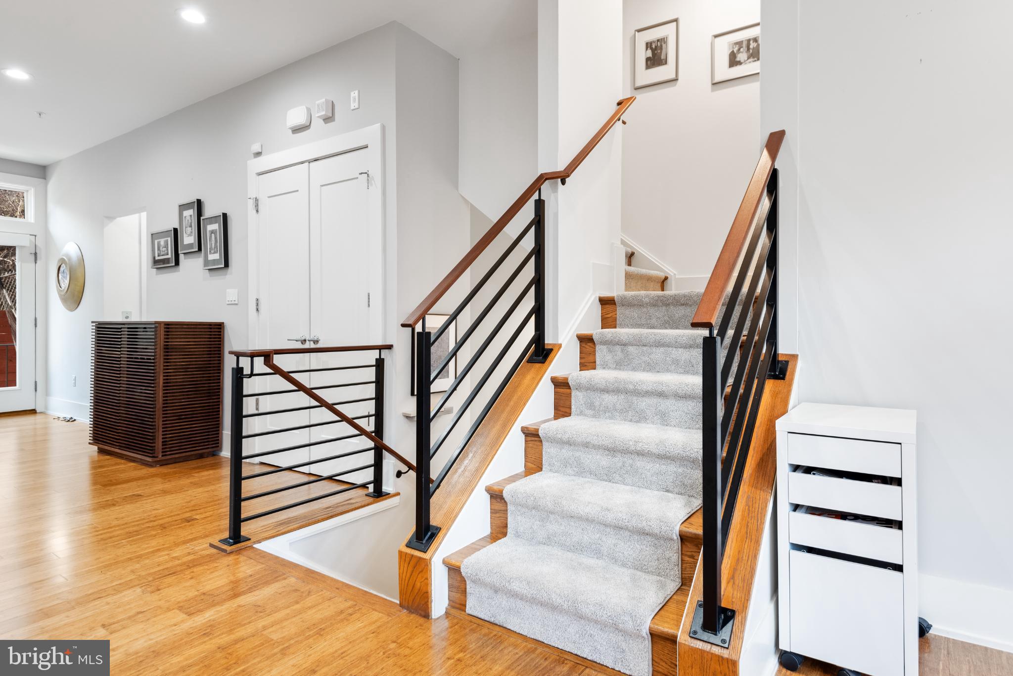 5117 Willet Bridge Road Bethesda, MD 20816 - Photo 8 of 46 a view of entryway and hall with wooden floor