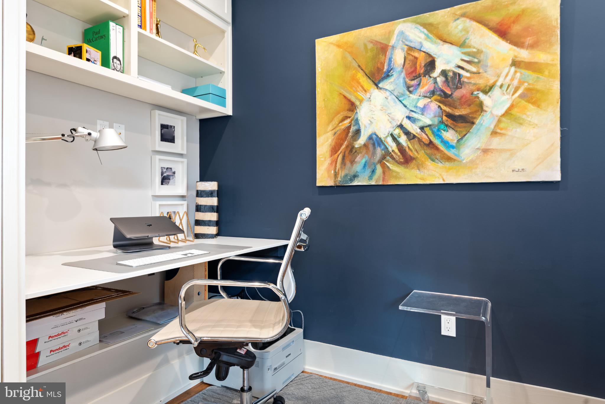 5117 Willet Bridge Road Bethesda, MD 20816 - Photo 9 of 46 a bathroom with a sink and a mirror