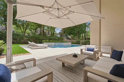a terrace with outdoor seating and garden