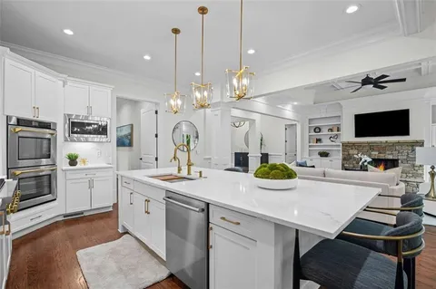 a spacious bedroom with a large bed and a window