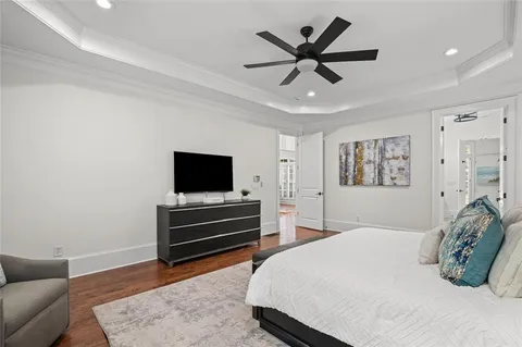 a large kitchen with stainless steel appliances granite countertop a stove and a refrigerator