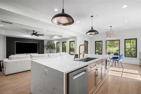 a living room with furniture and a gate