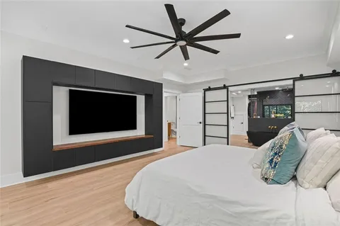 a view of a yard with large trees