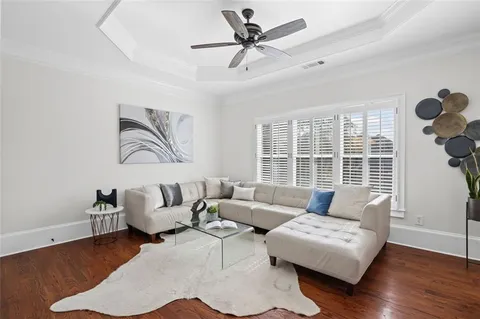 an aerial view of a house with a yard and garden