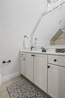 an aerial view of a house with a garden