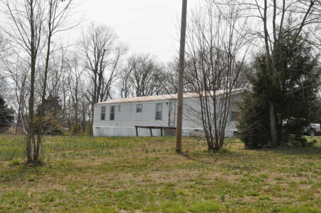 10739 Hall Road Bon Aqua, TN 37025 - Photo 16 of 16 Single-wide on property currently rented for $400.00 per month.