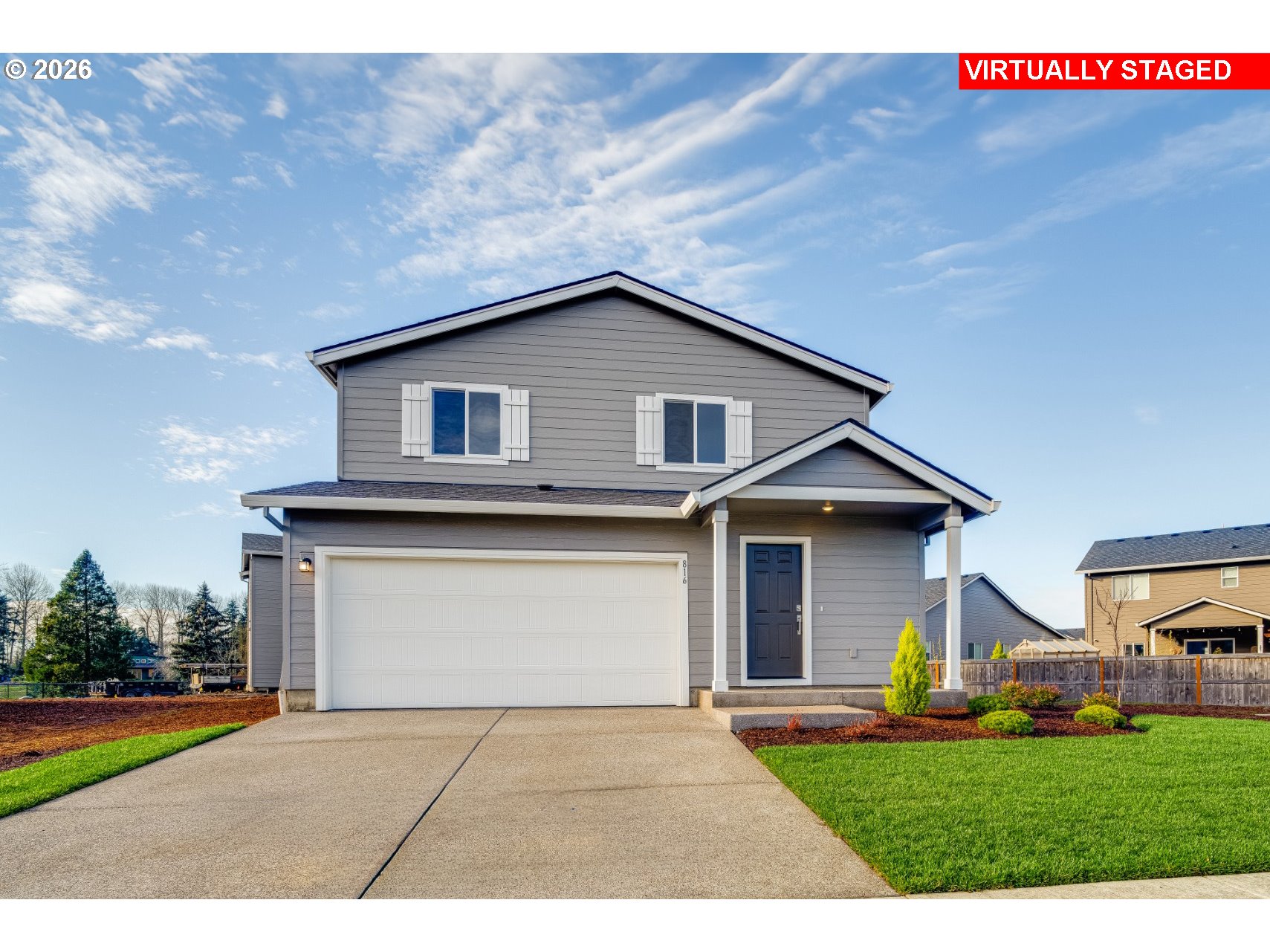 25248 Tanglewood Way Veneta, OR 97487 - Photo 1 of 28 a front view of a house with a yard and garage
