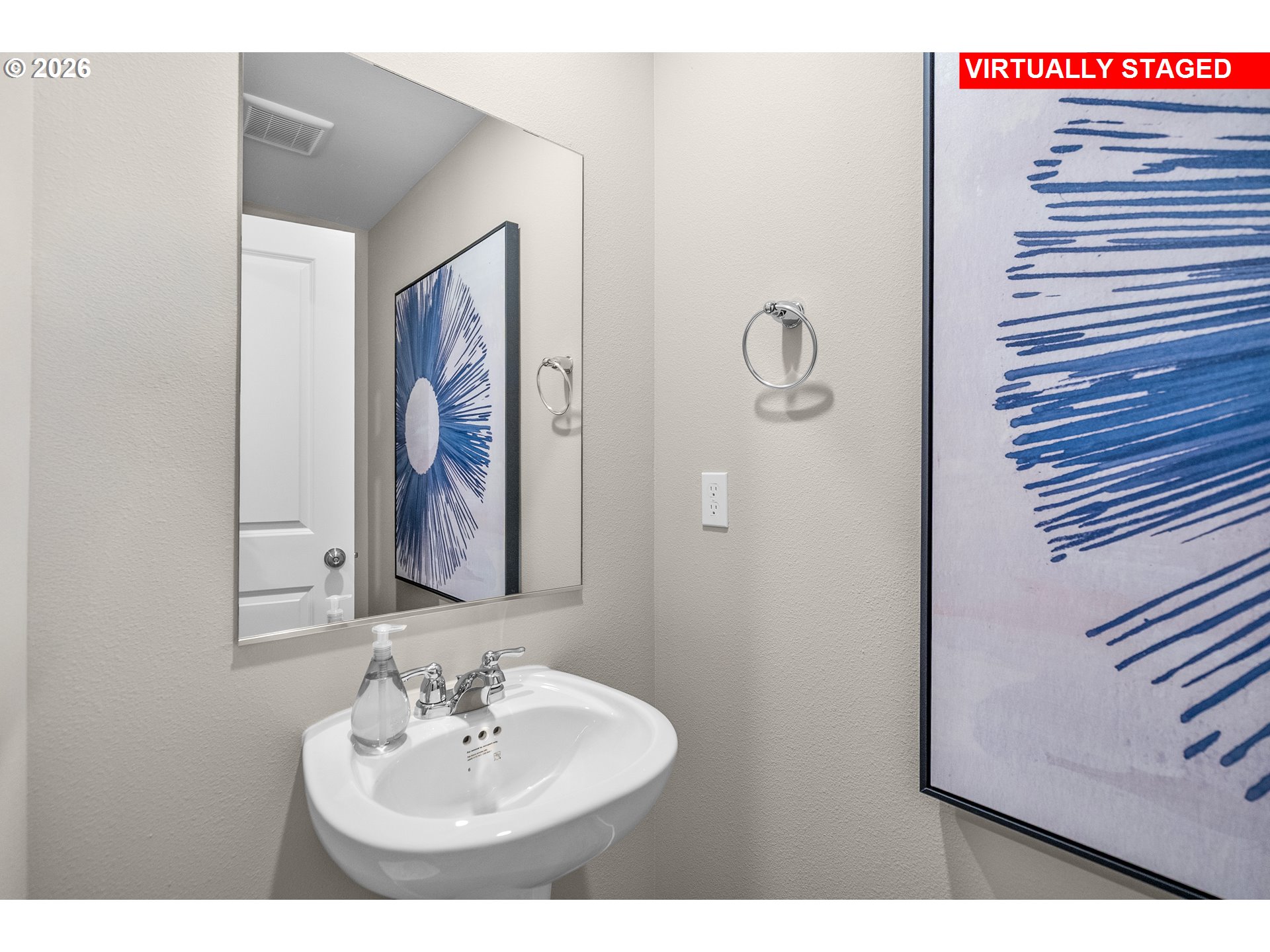 25248 Tanglewood Way Veneta, OR 97487 - Photo 16 of 28 a bathroom with a sink and a mirror