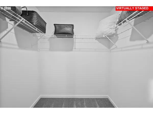 a bathroom with a sink mirror vanity toilet and shower