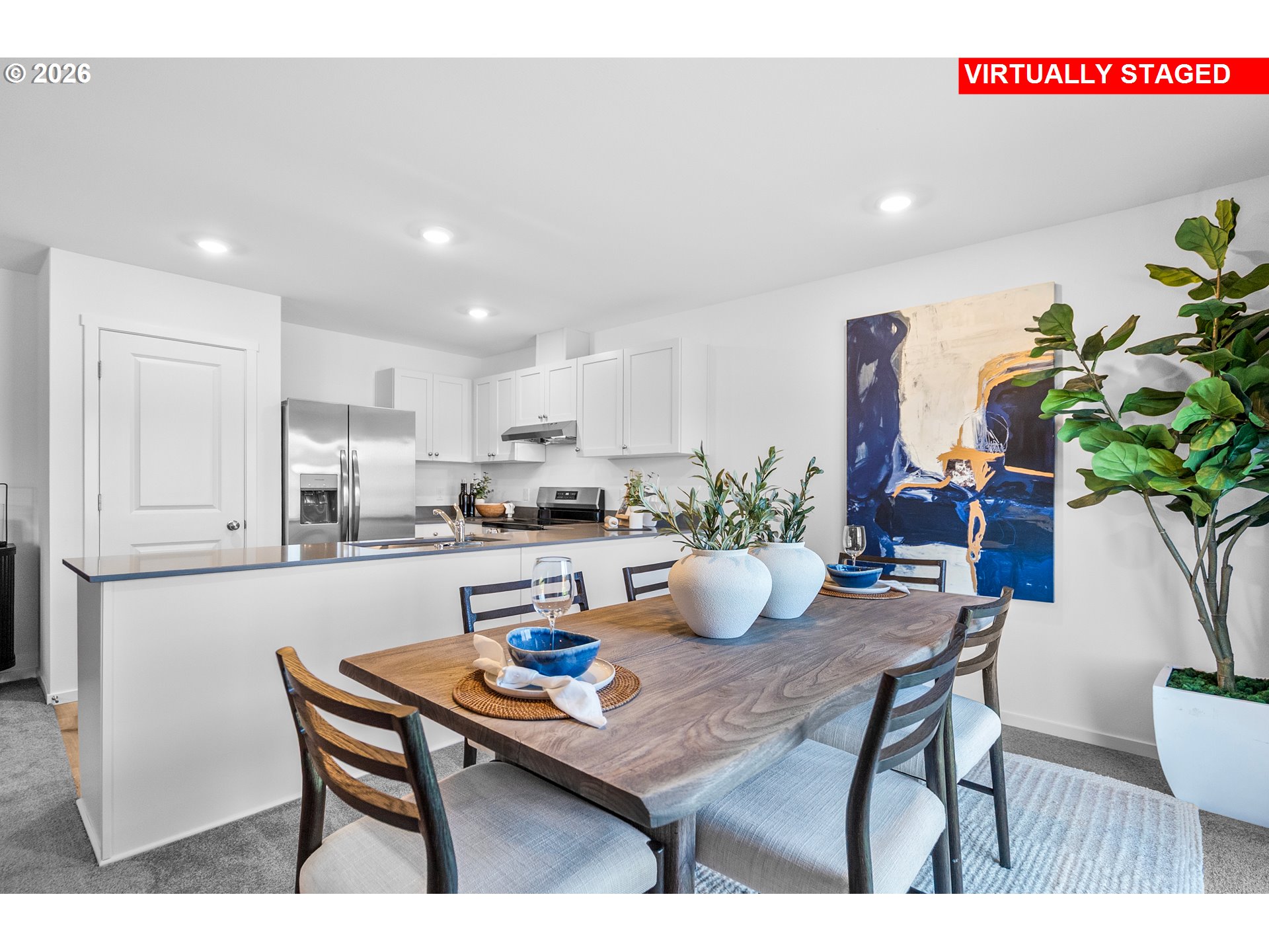 25248 Tanglewood Way Veneta, OR 97487 - Photo 10 of 28 a kitchen with a table and chairs in it